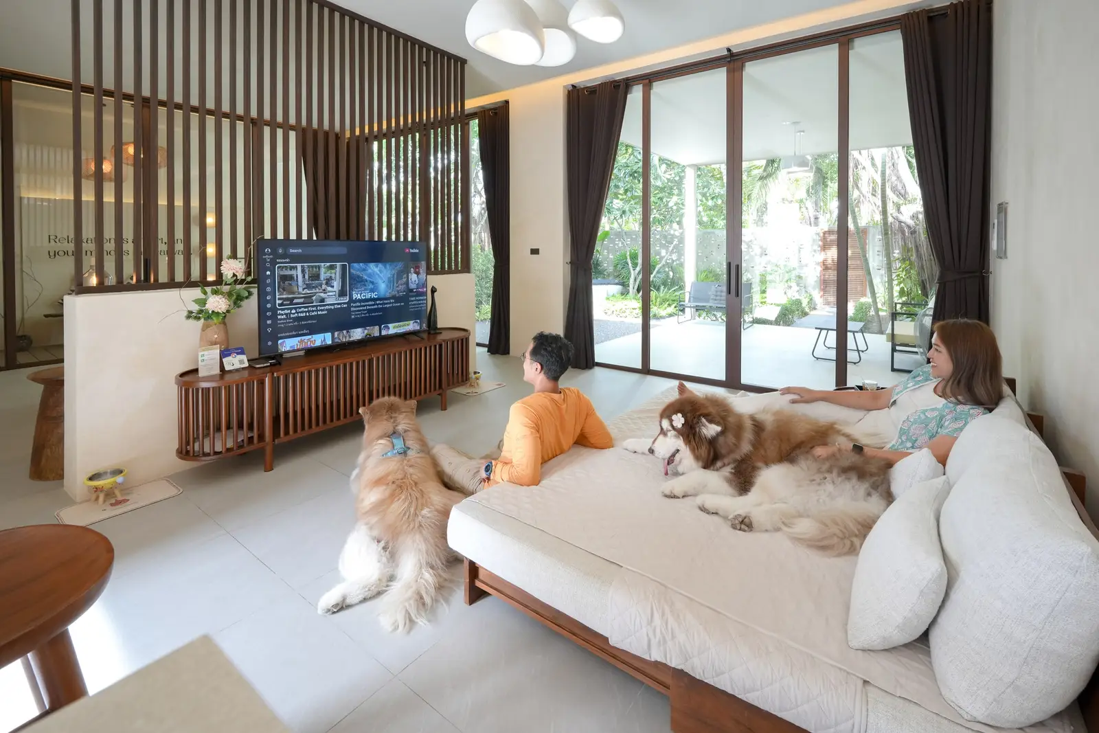 Guests and dogs relaxing in the living room